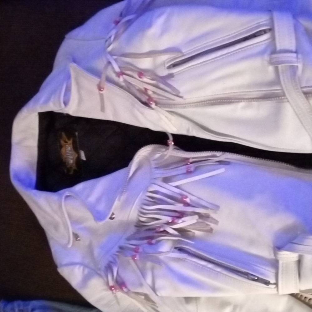 Universal Rider white leather ladies jacket ,size 6, beaded.